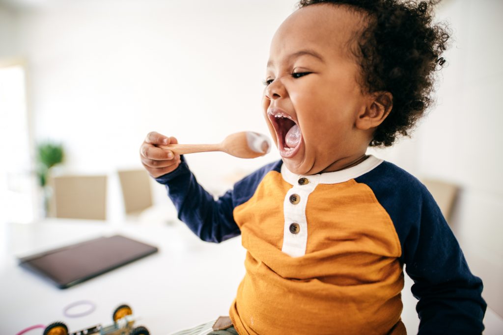 toddler eating food