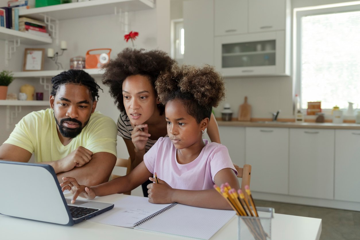 FamilyLookingAtComputer