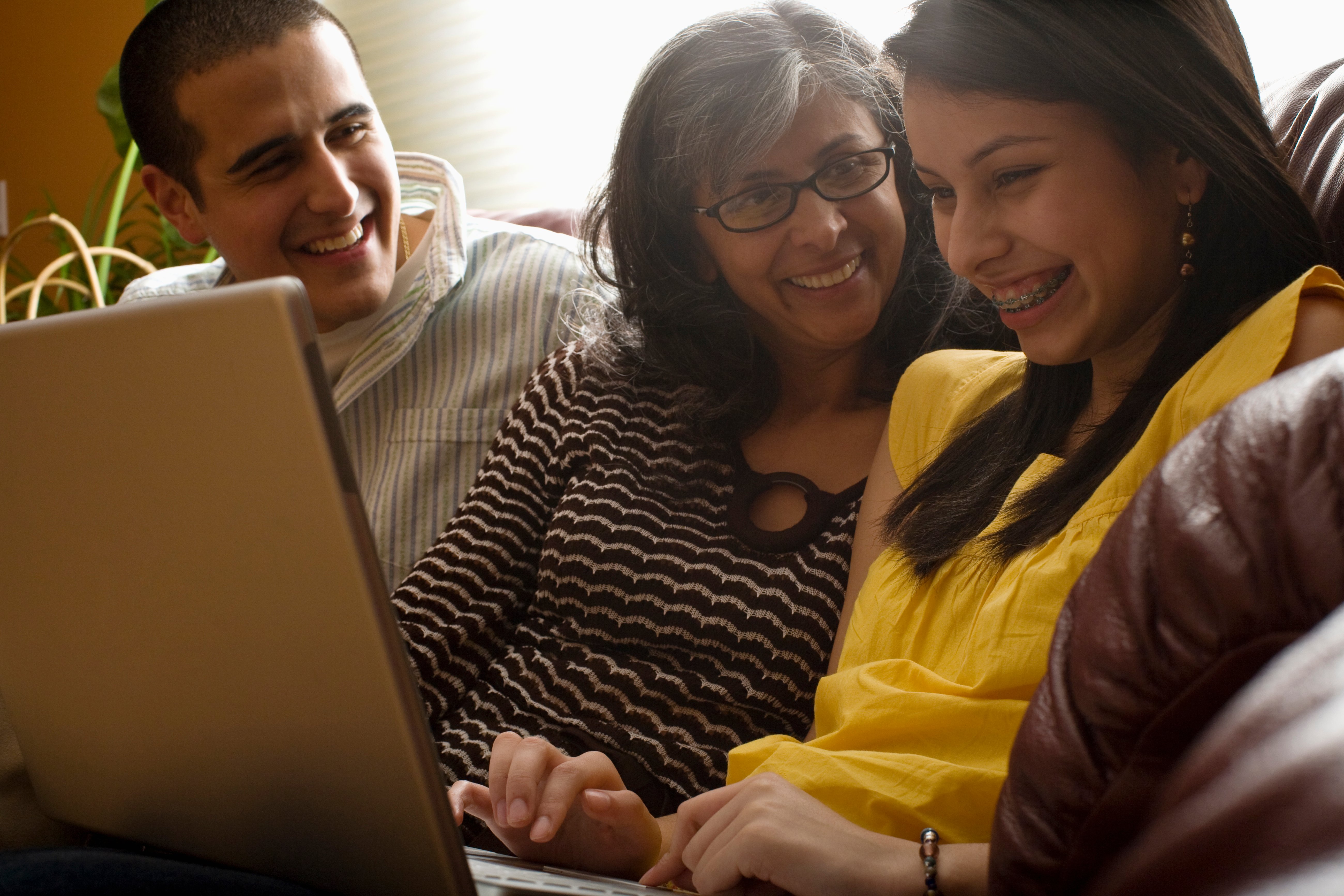 FamilyLookingatLaptop