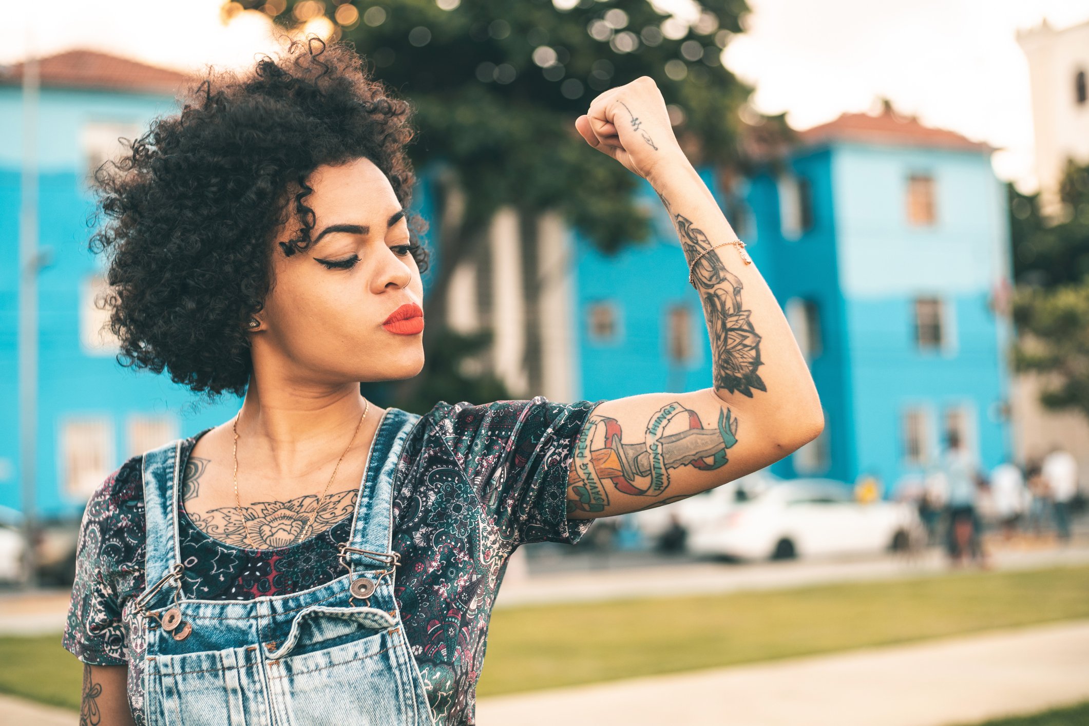 Woman flexing her muscles