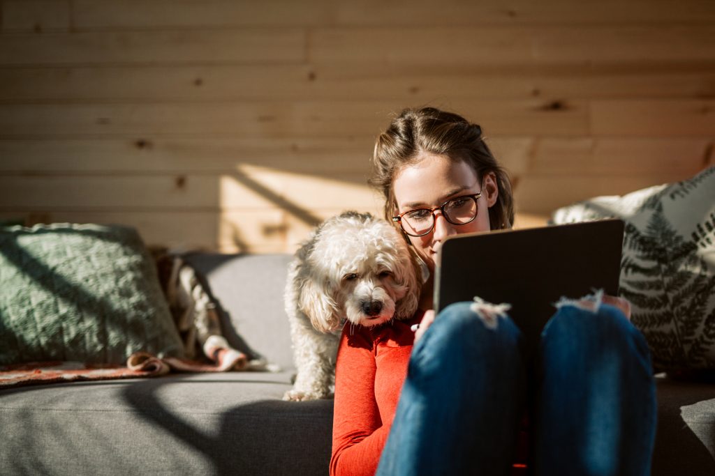 Woman working on tablet at home